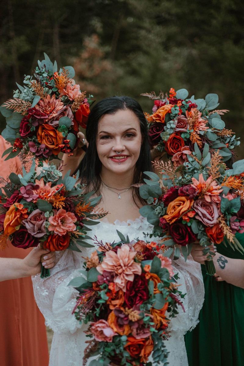 Fall-themed bouquets in dusty rose, terracotta, rust, and deep burgundy