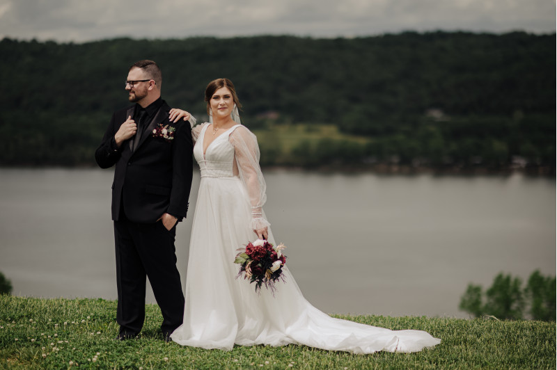 Artificial wedding flowers in ivory, burgundy, and gold tones