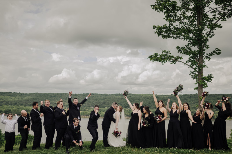 Black and gold boutonniere with burgundy and ivory silk flowers