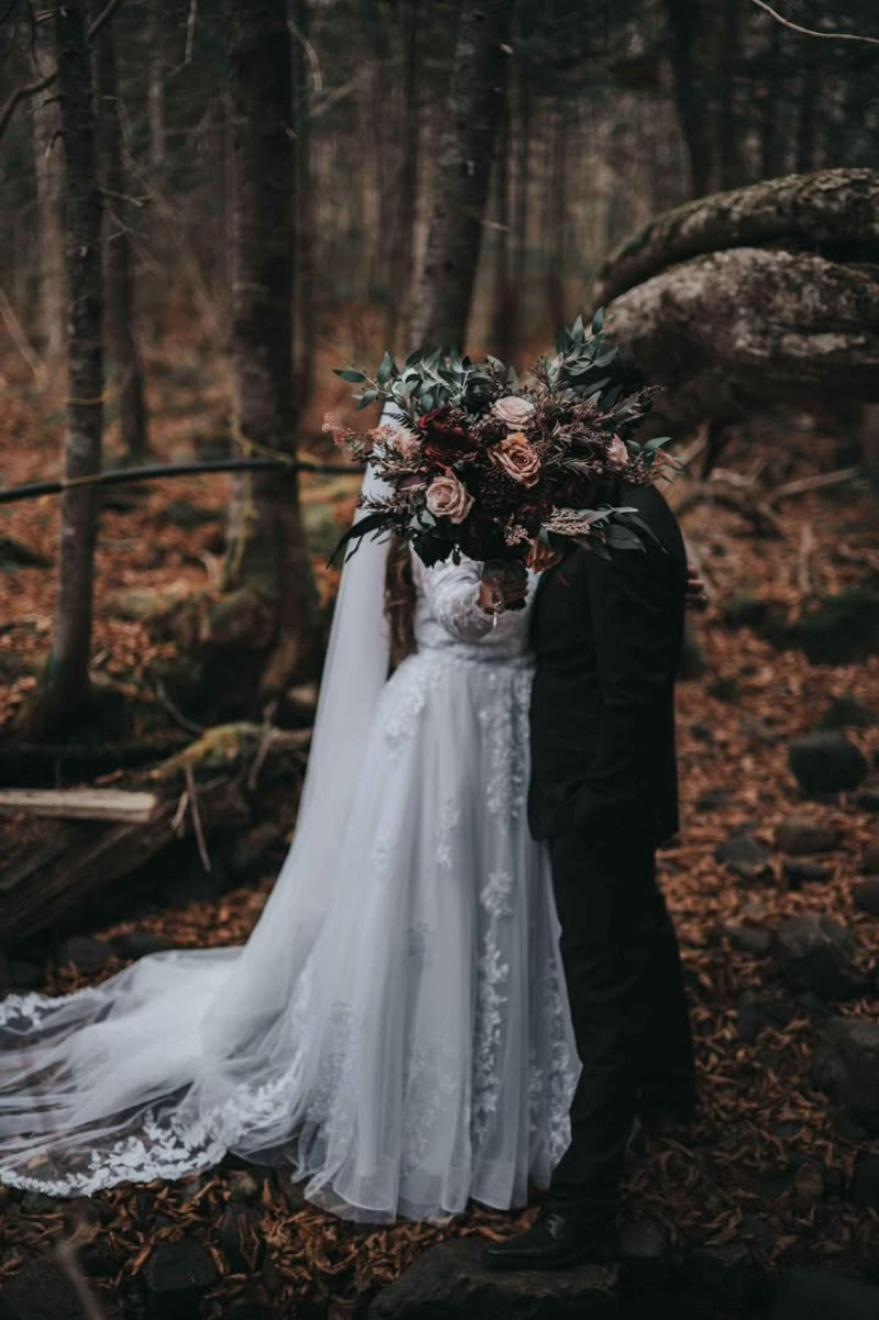 Purple, Burgundy & Beige wedding bouquet close-up, bride and groom with bouquet covering faces720-1202.2222222222