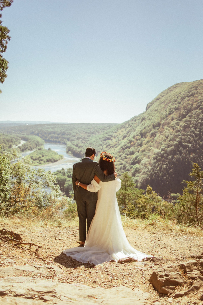 Wedding floral details in rust, burgundy, and cinnamon orange palette