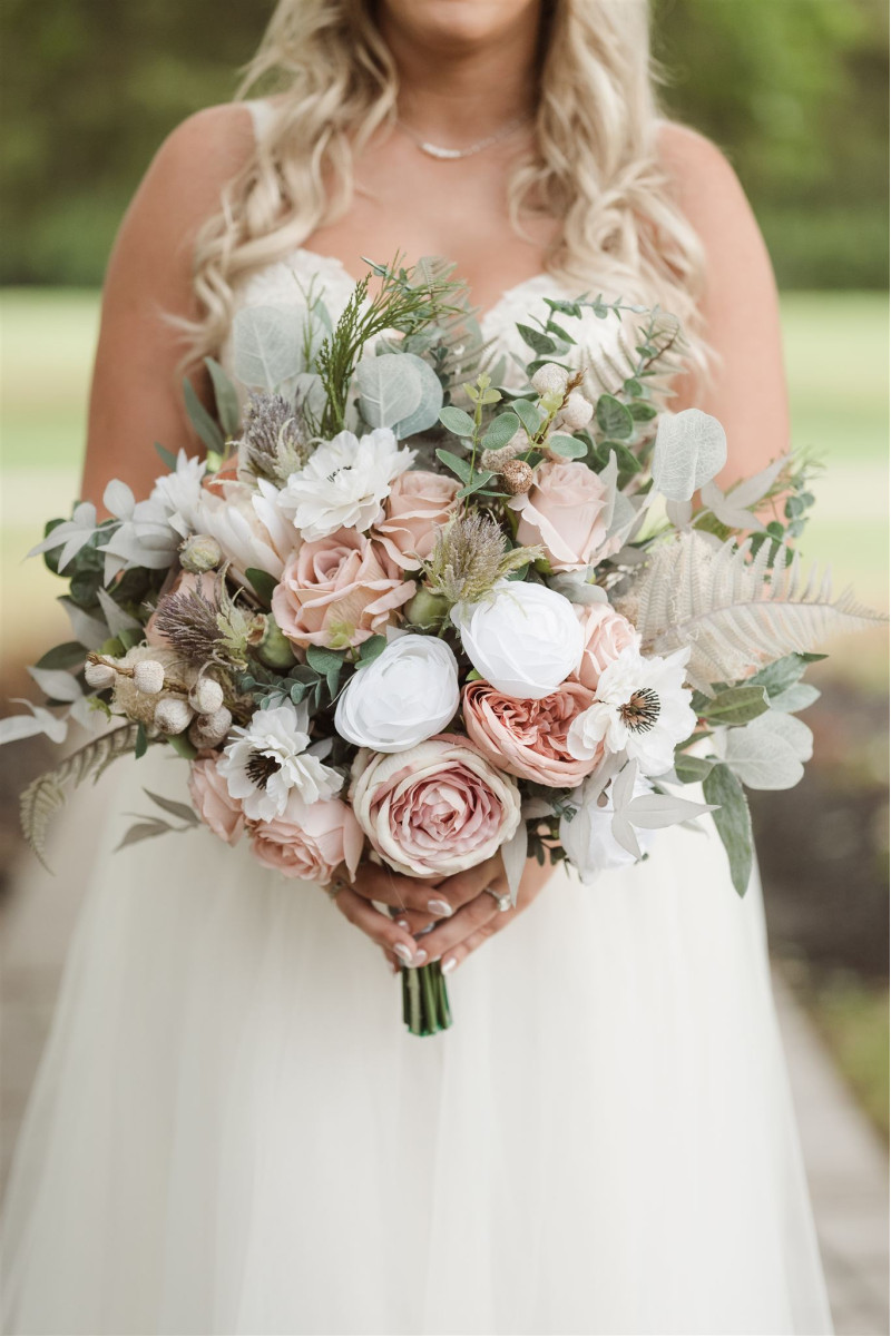 Elegant faux bridal bouquet in blush pink, white, and beige wedding color palette