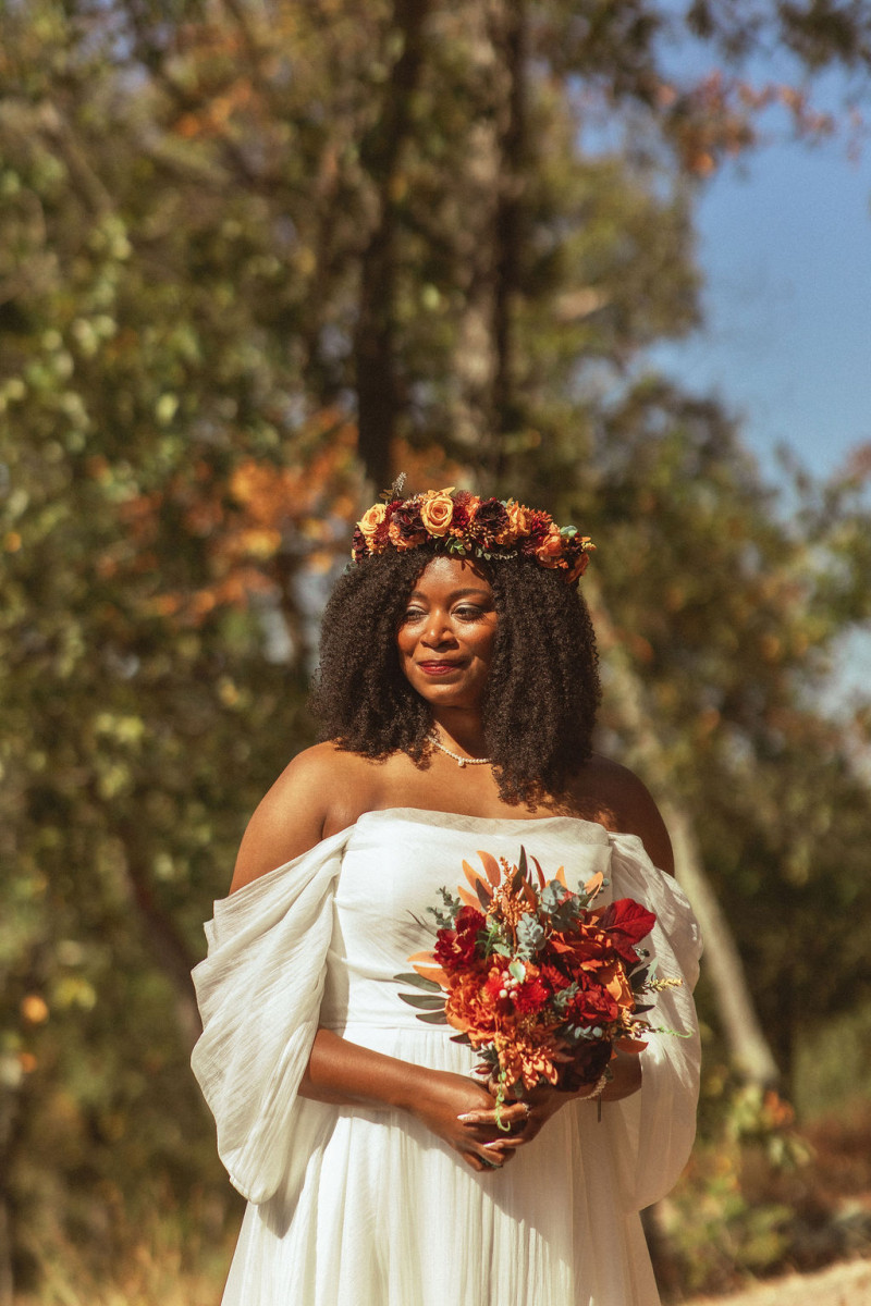 Bridal bouquet close-up in rust burgundy cinnamon orange color palette