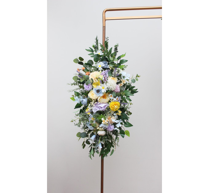 Wildflower arch flowers in yellow, ivory, dusty blue and lavender