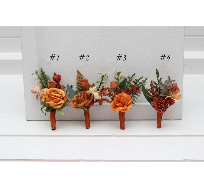 Wedding boutonnieres and wrist corsage in rust orange color scheme. Flower accessories. 5213