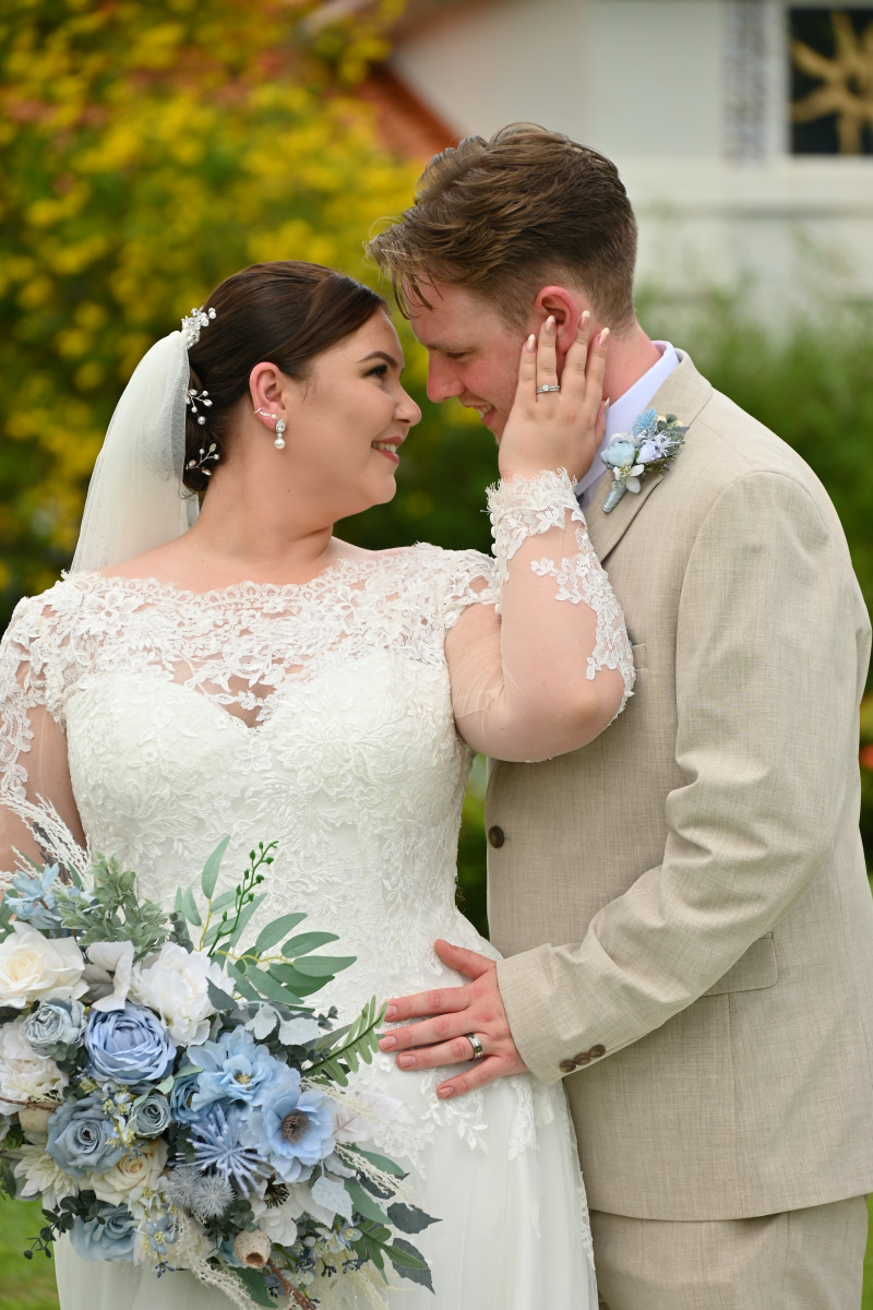 Bride and Groom Portrait with Dusty Blue & White Wedding Flowers and Matching Boutonniere3008-1200
