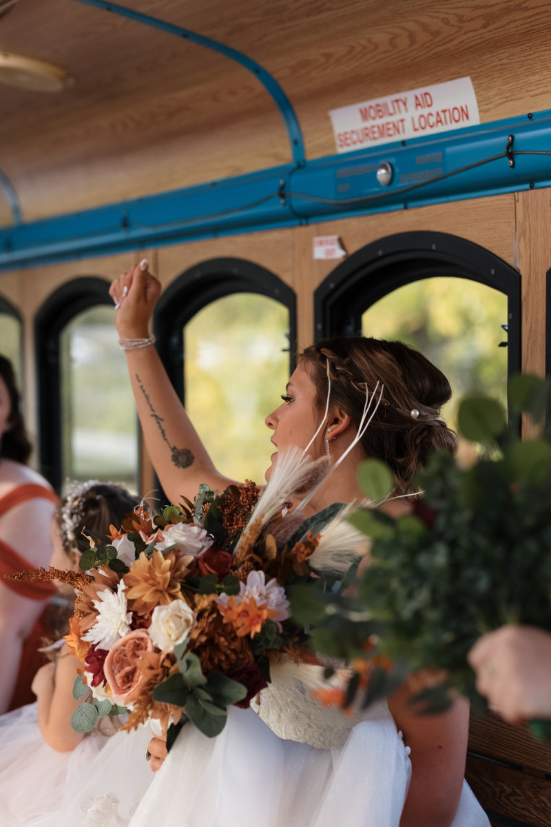 Burgundy and orange bridal bouquet with pampas and ivory florals