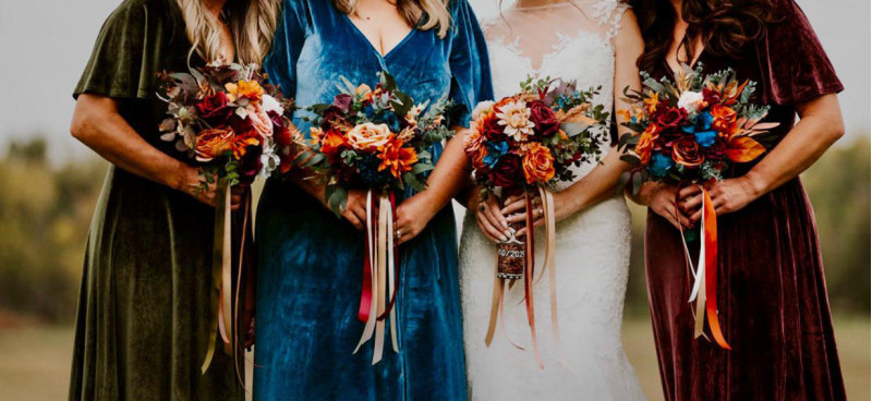 Fall wedding bouquets in burnt orange, rust, navy blue and burgundy