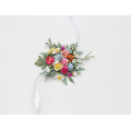 Colorful wrist corsage with wildflowers