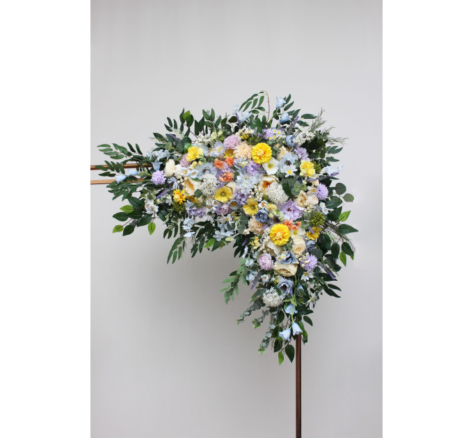 Wildflower arch flowers in yellow, ivory, dusty blue and lavender