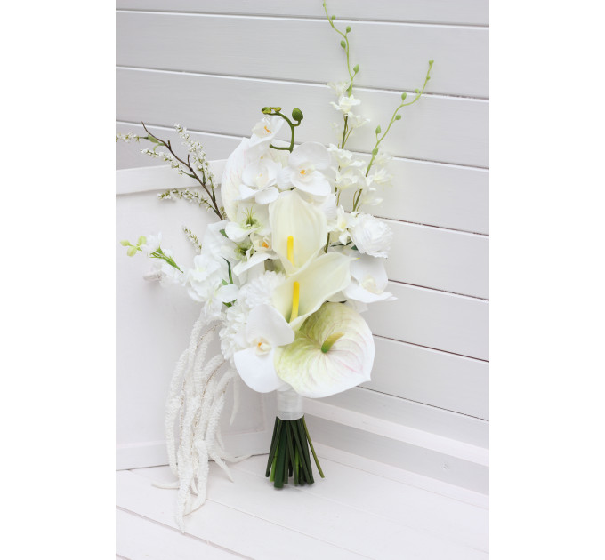 Asymmetrical bridal bouquet in white and ivory with amaranth