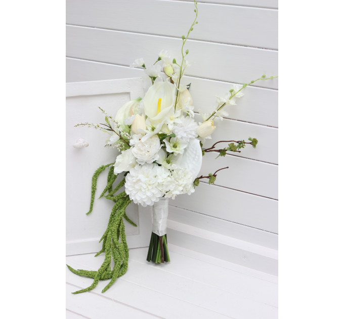 Modern asymmetrical bridal bouquet in white with cascading amaranth
