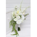 Modern asymmetrical bridal bouquet in white with cascading amaranth