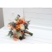 Boho bouquet with pampas grass in orange ivory rust terracotta wedding color scheme. Bouquet of fake flowers for fall wedding
