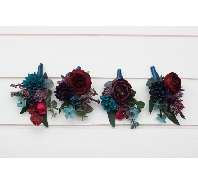 Wedding boutonnieres and wrist corsage. Flower accessories. 
Purple magenta accessories .Burgundy teal flowers. 5297