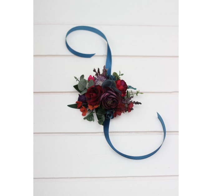  Wedding boutonnieres and wrist corsage. Flower accessories. 
Purple magenta accessories .Burgundy teal flowers. 5297