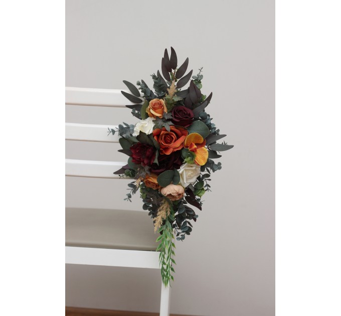 Aisle flowers in rust orange burgundy scheme. Chair flowers. Sign flowers. Marker flowers. Wedding flowers. Flowers for wedding decor. 0035