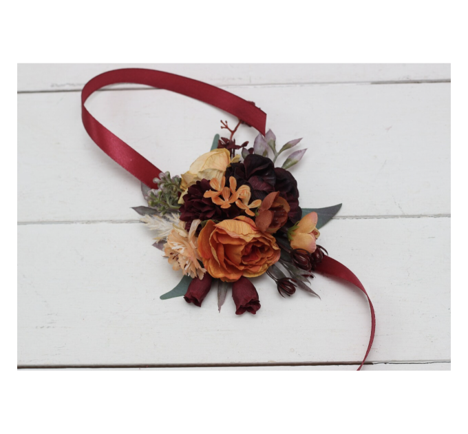 Wedding boutonnieres and wrist corsage in rust burgundy cinnamon color theme. Flower accessories. 0044 EU UK