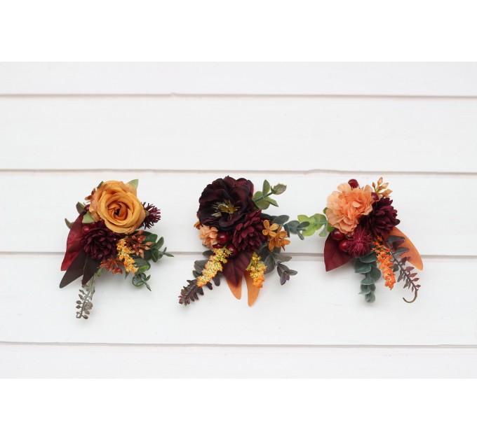 Wedding boutonnieres and wrist corsage  in rust burgundy cinnamon orange color theme. Flower accessories. 0033