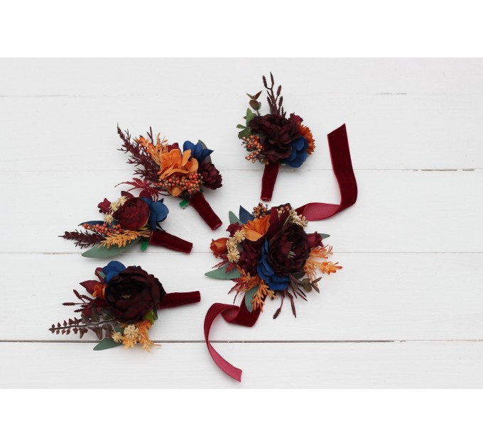 Wedding boutonnieres and wrist corsage in rust orange burgundy navy blue color theme. Flower accessories. 0043 EU UK