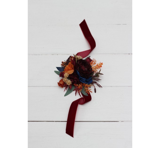 Wedding boutonnieres and wrist corsage in rust orange burgundy navy blue color theme. Flower accessories. 0043 EU UK