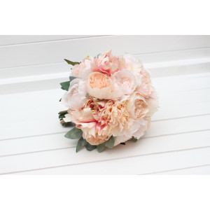 Bridal bouquet of classic round shape in peach and blush pink colors. Faux blooms for a wedding. 5412