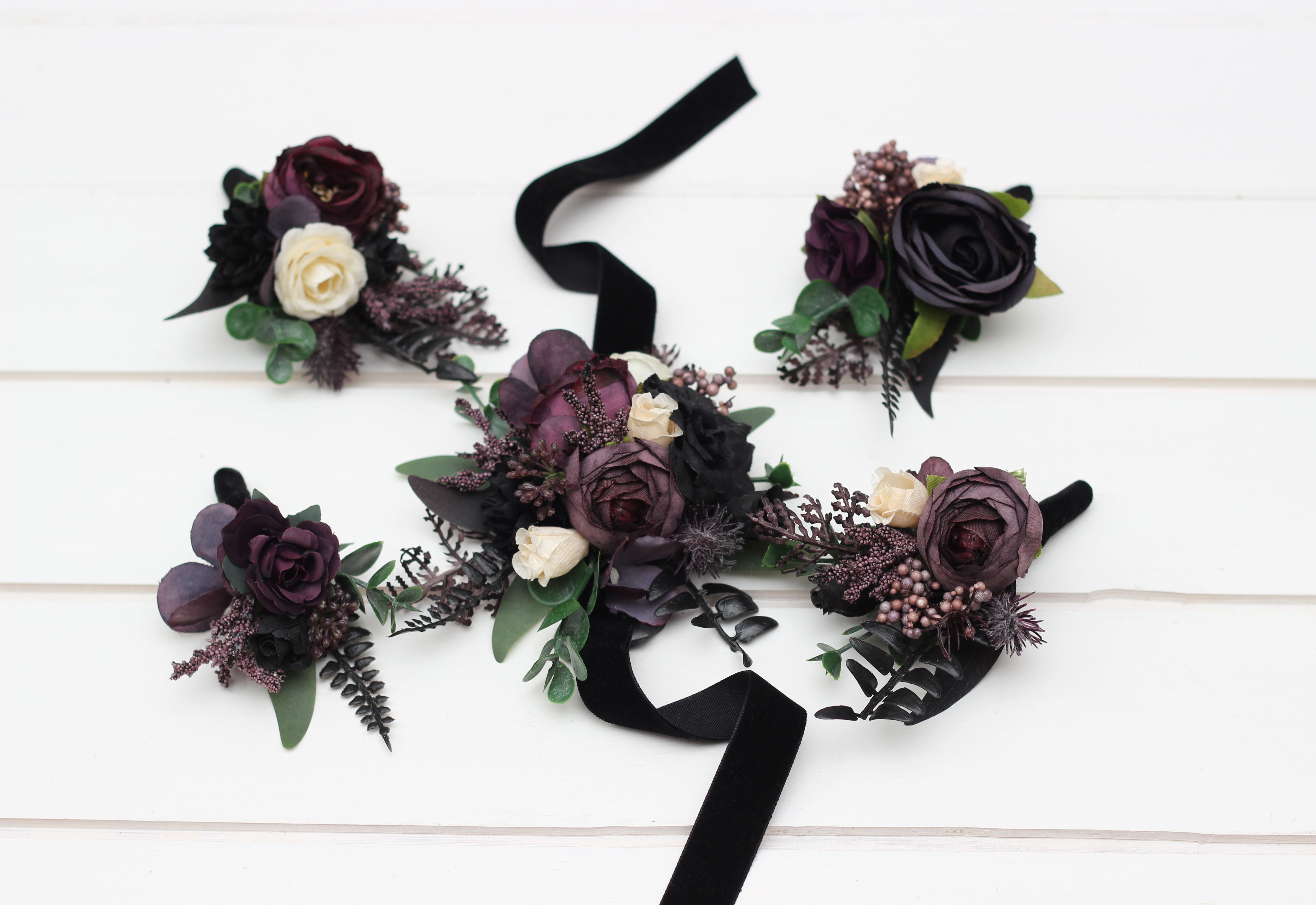 Deep purple black ivory and green wedding flowers