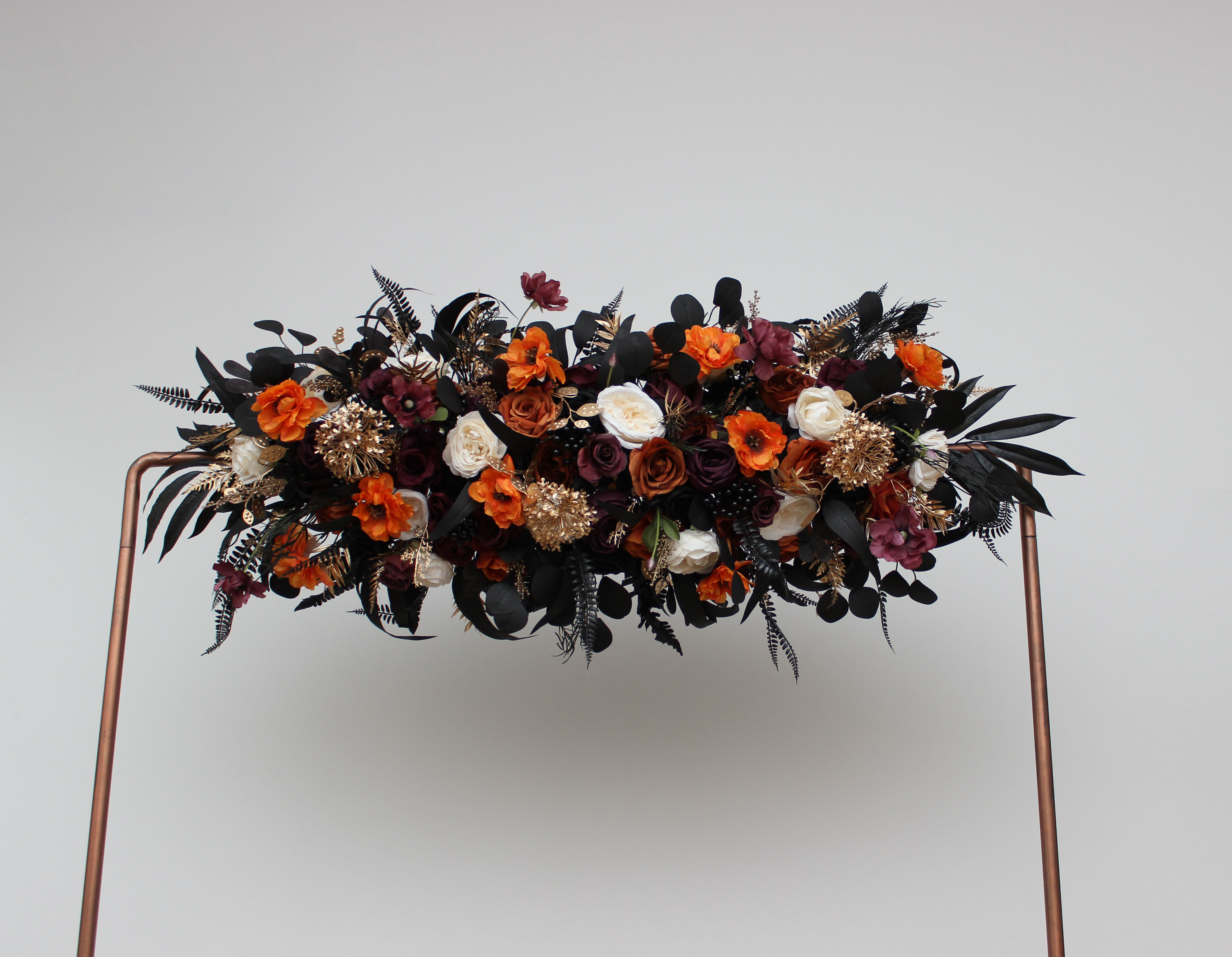 Purple black rust and gold boutonniere