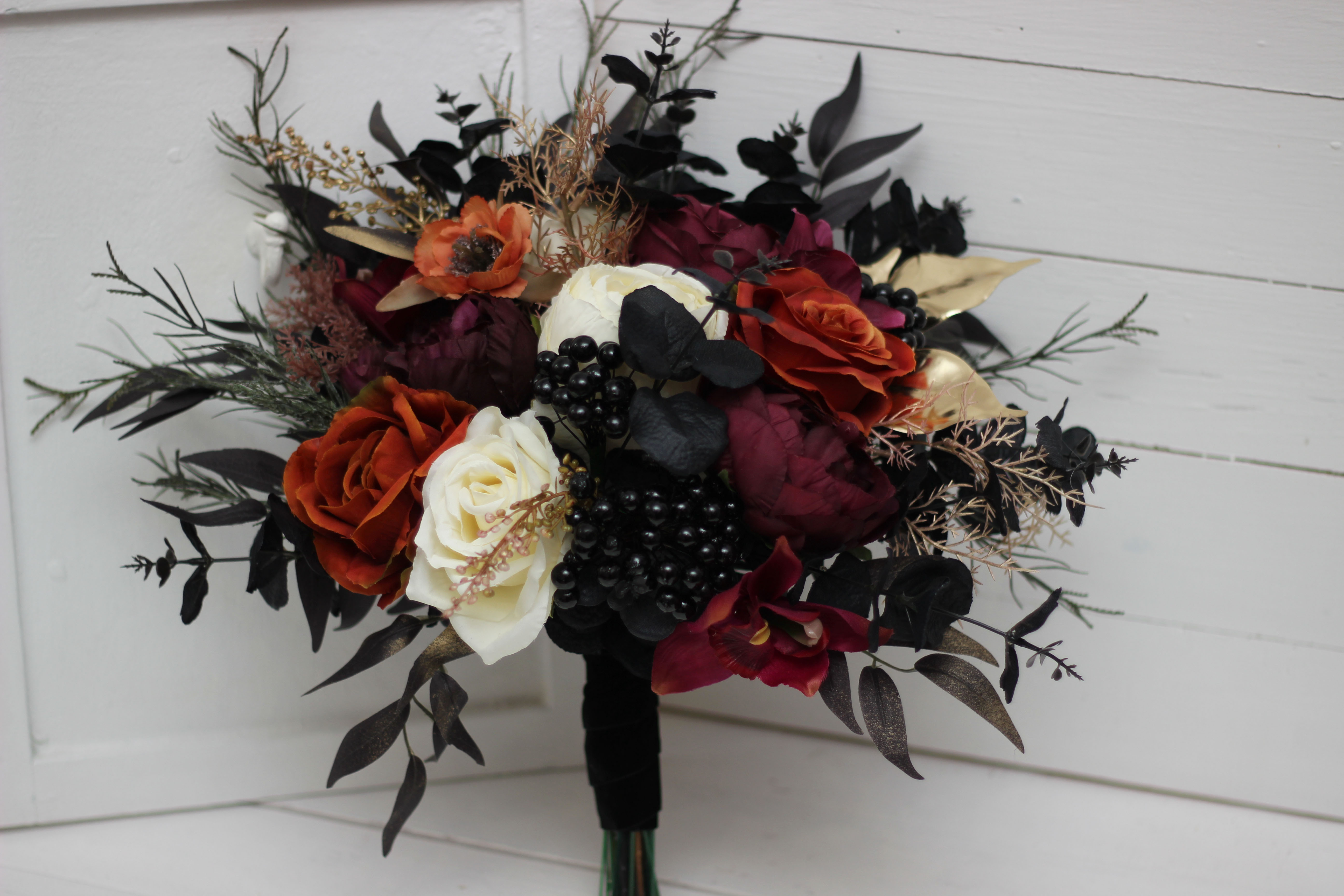 Purple black rust and gold bridal bouquet