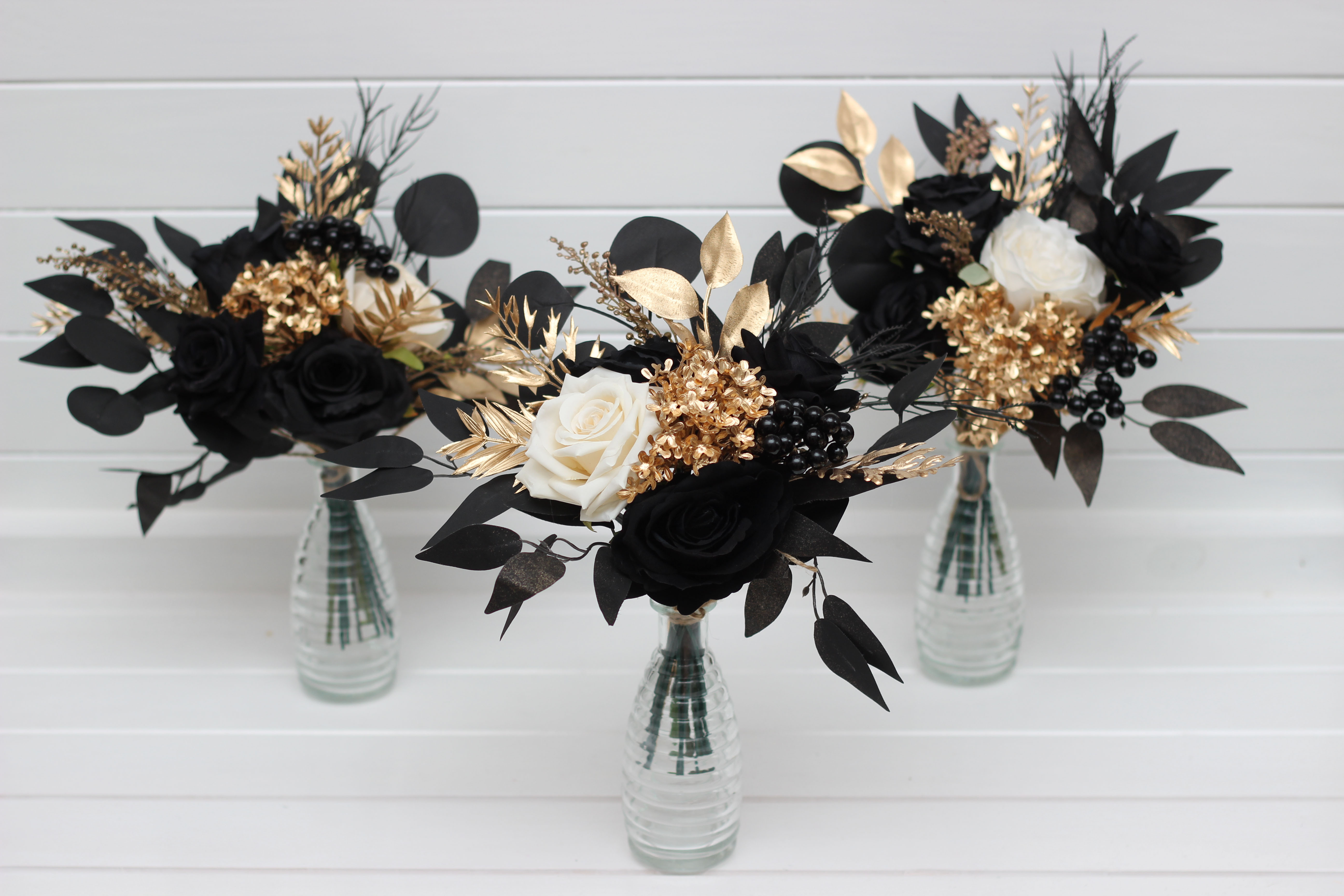Ivory black and gold wedding flowers