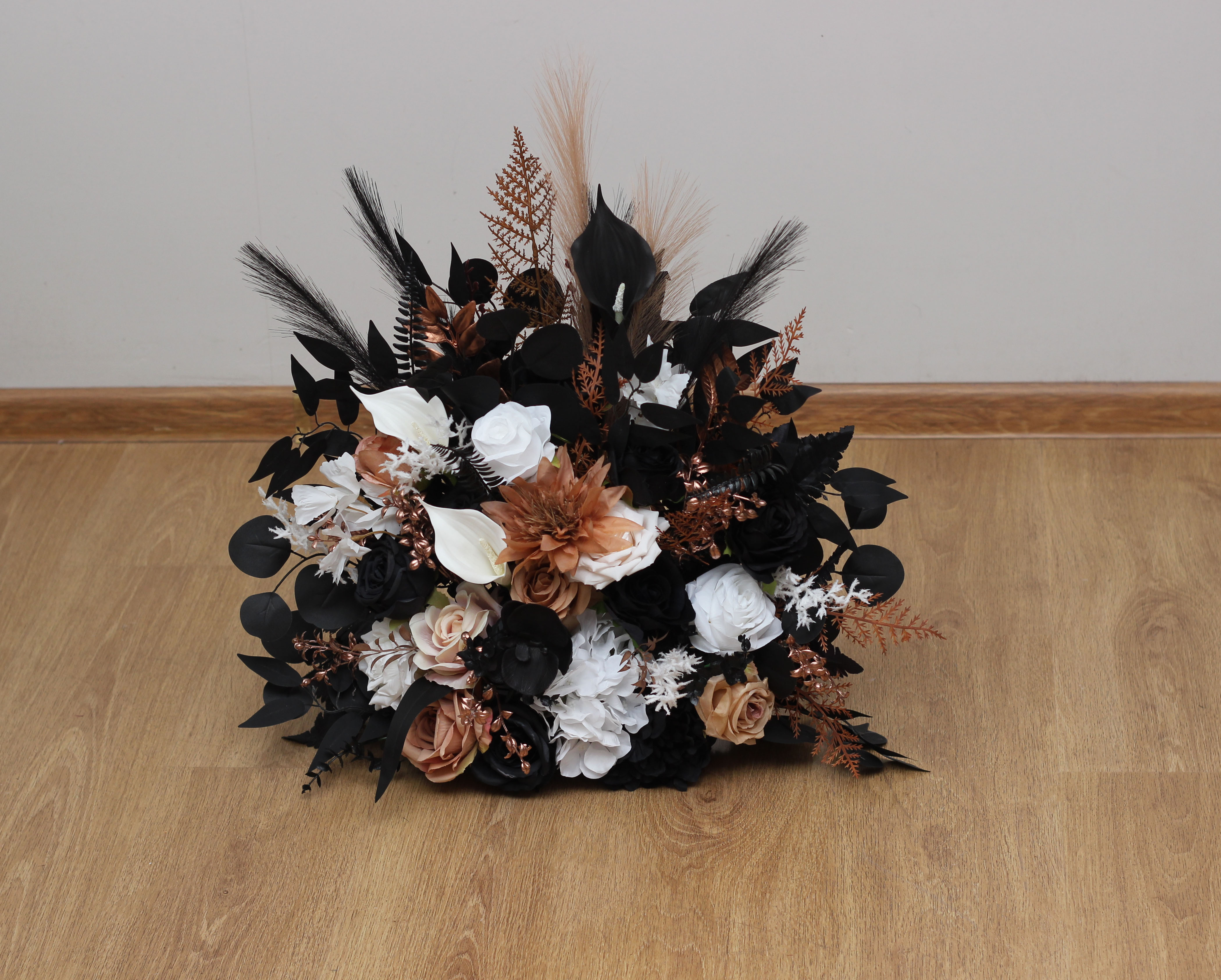 Dusty rose black cinnamon floral arrangement