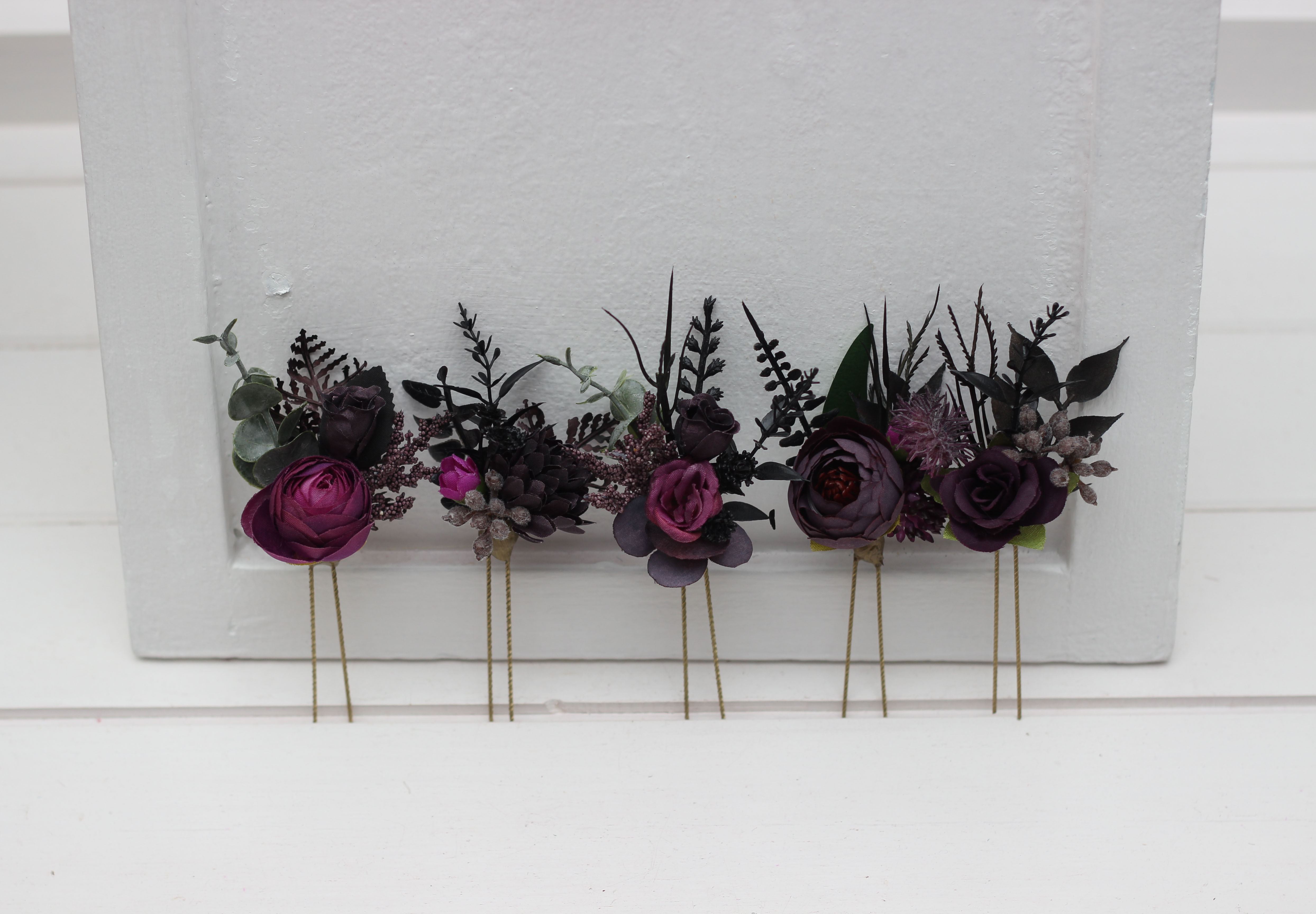 Black purple and magenta boutonniere