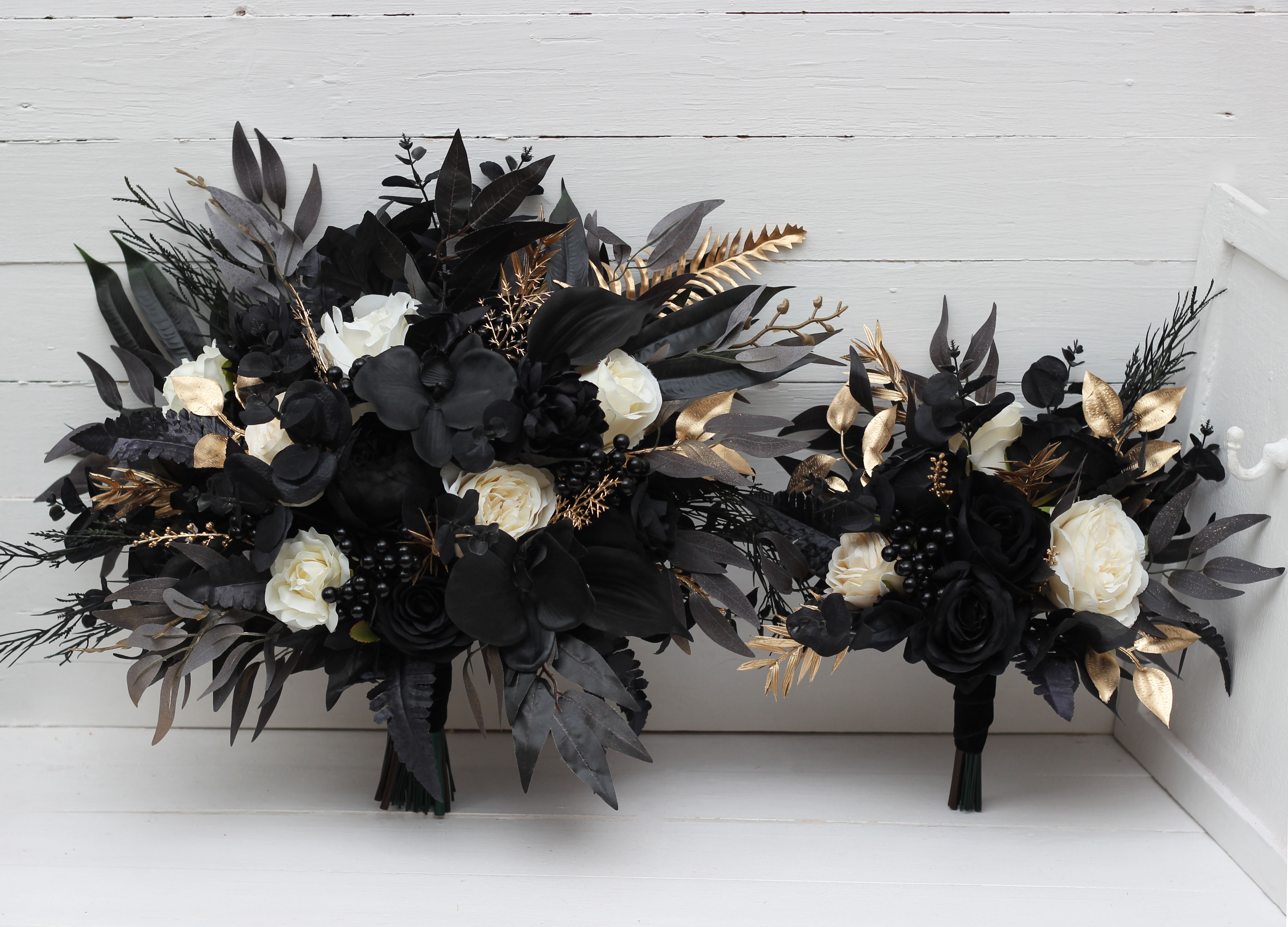 Ivory black and gold floral arrangement