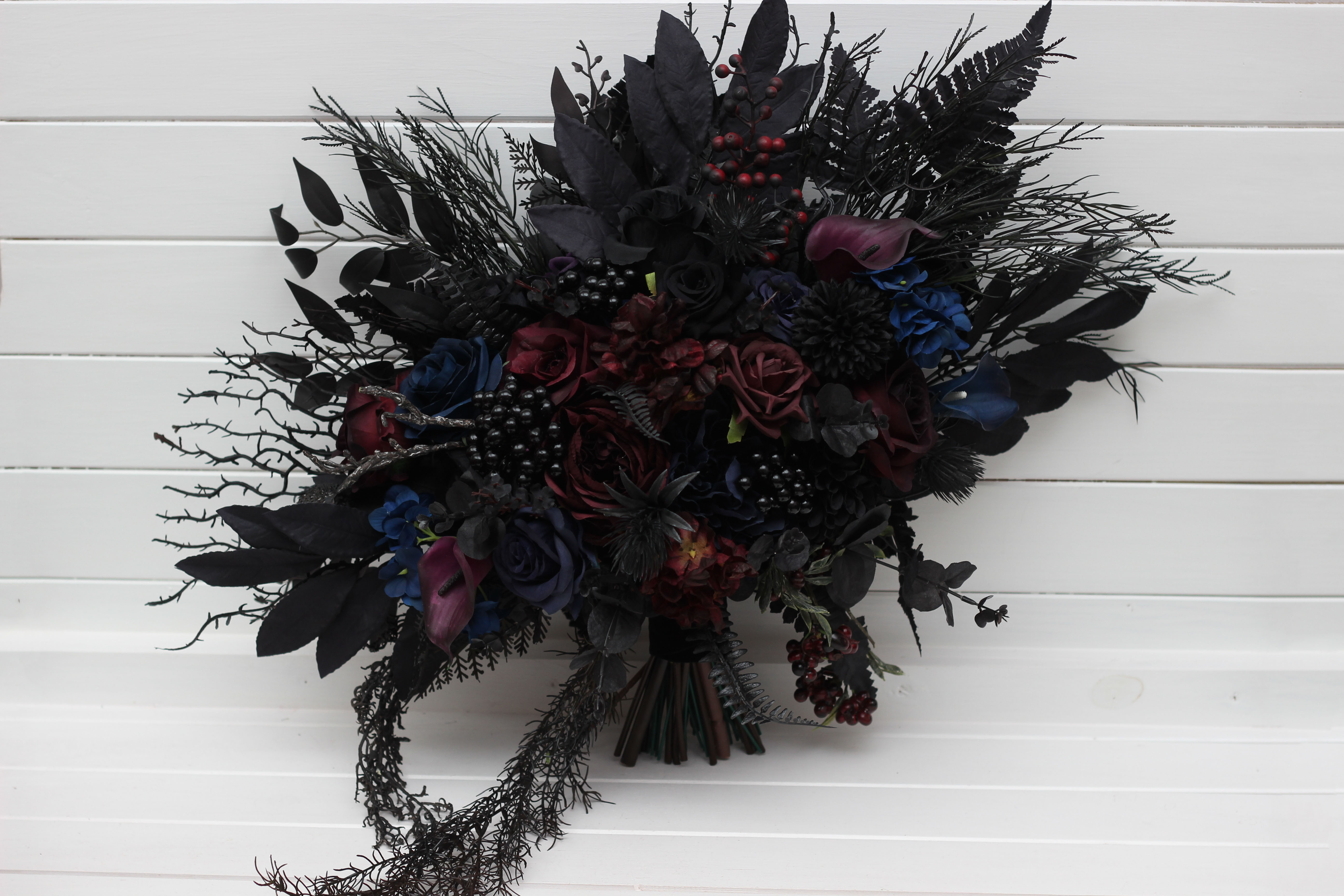 Burgundy black blue and purple bridal bouquet