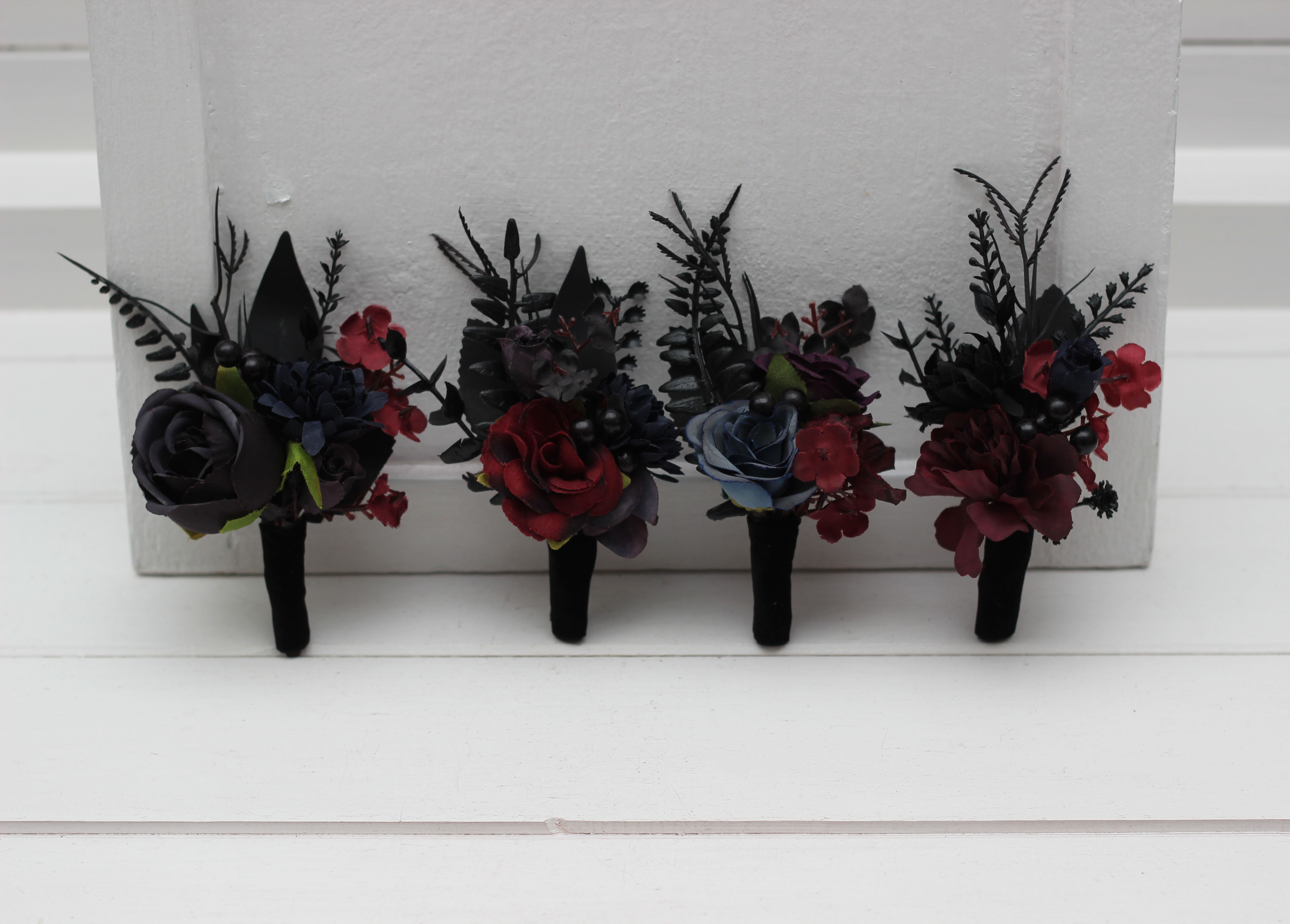 Burgundy black blue and purple wedding flowers