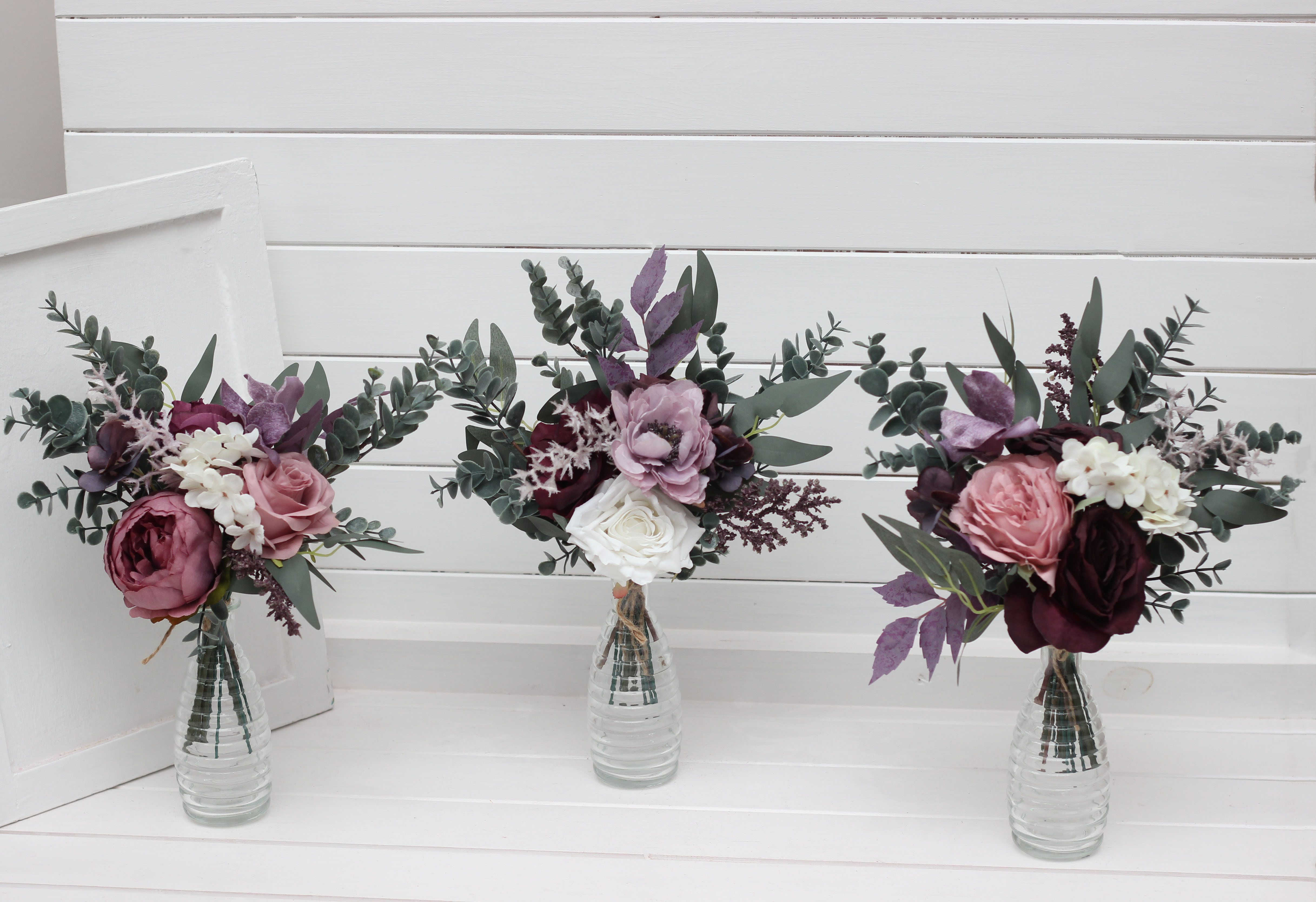 Deep purple lilac white bridesmaid bouquet