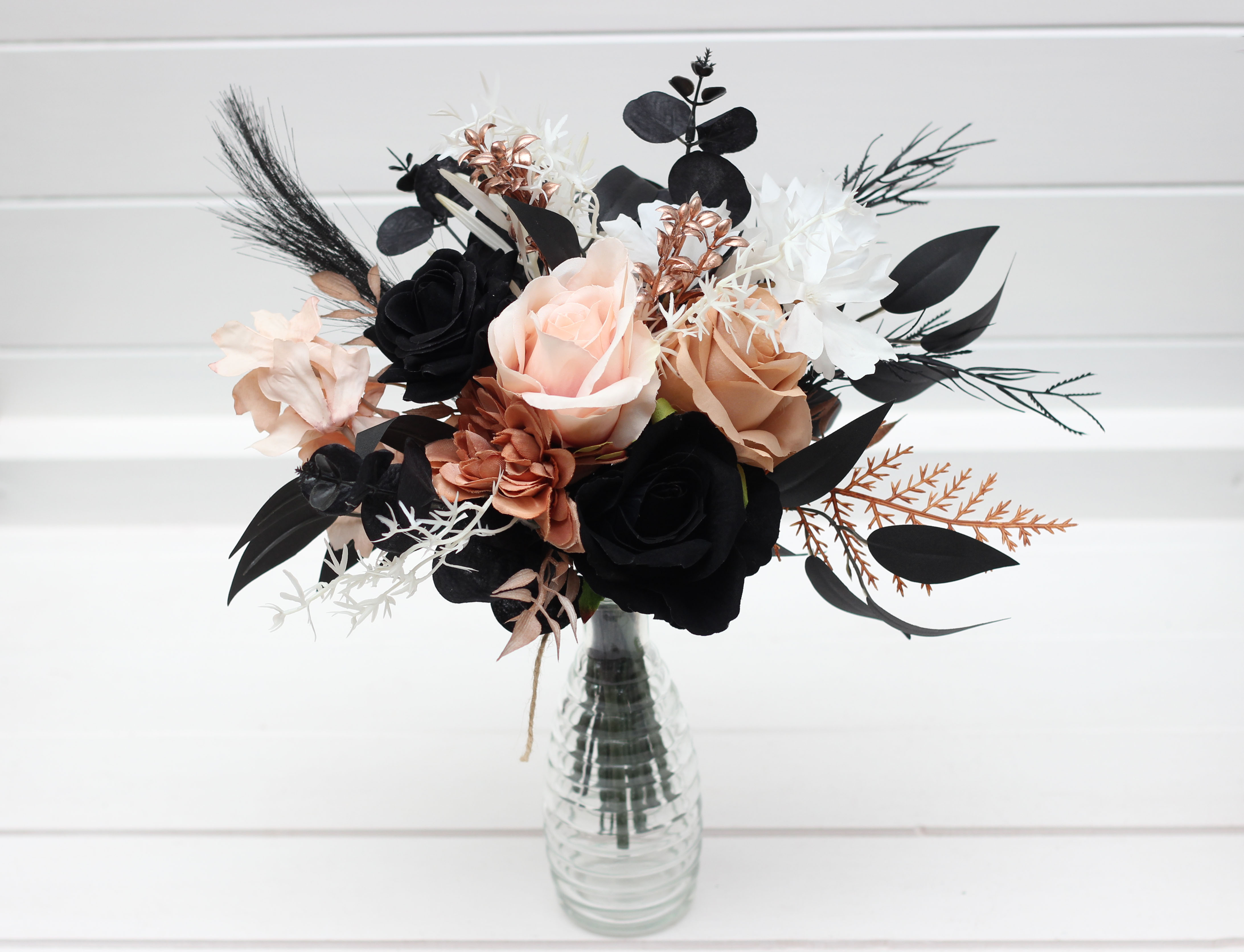 Dusty rose black cinnamon wedding centerpiece