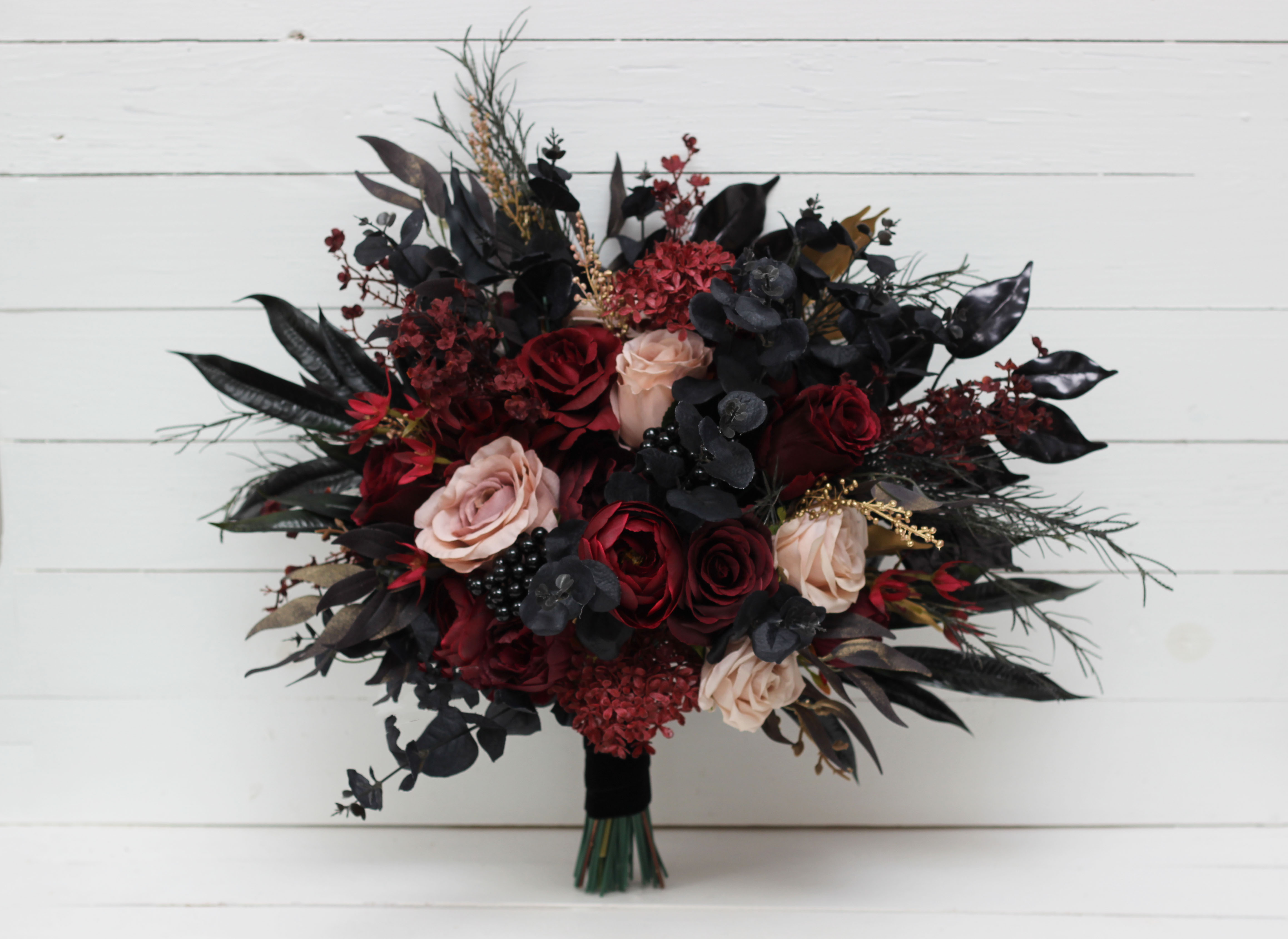 Burgundy black gold and beige boutonniere