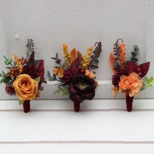 Wedding boutonnieres and wrist corsage  in rust burgundy cinnamon orange color theme. Flower accessories. 0033
