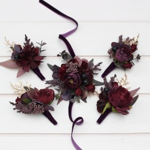  Wedding boutonnieres and wrist corsage  in purple burgundy gold color scheme. 5223