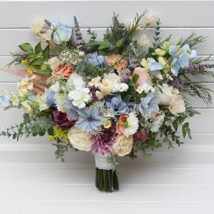 Pastel wildflower bridal bouquet in dusty blue, peach, lilac and cream. 5428